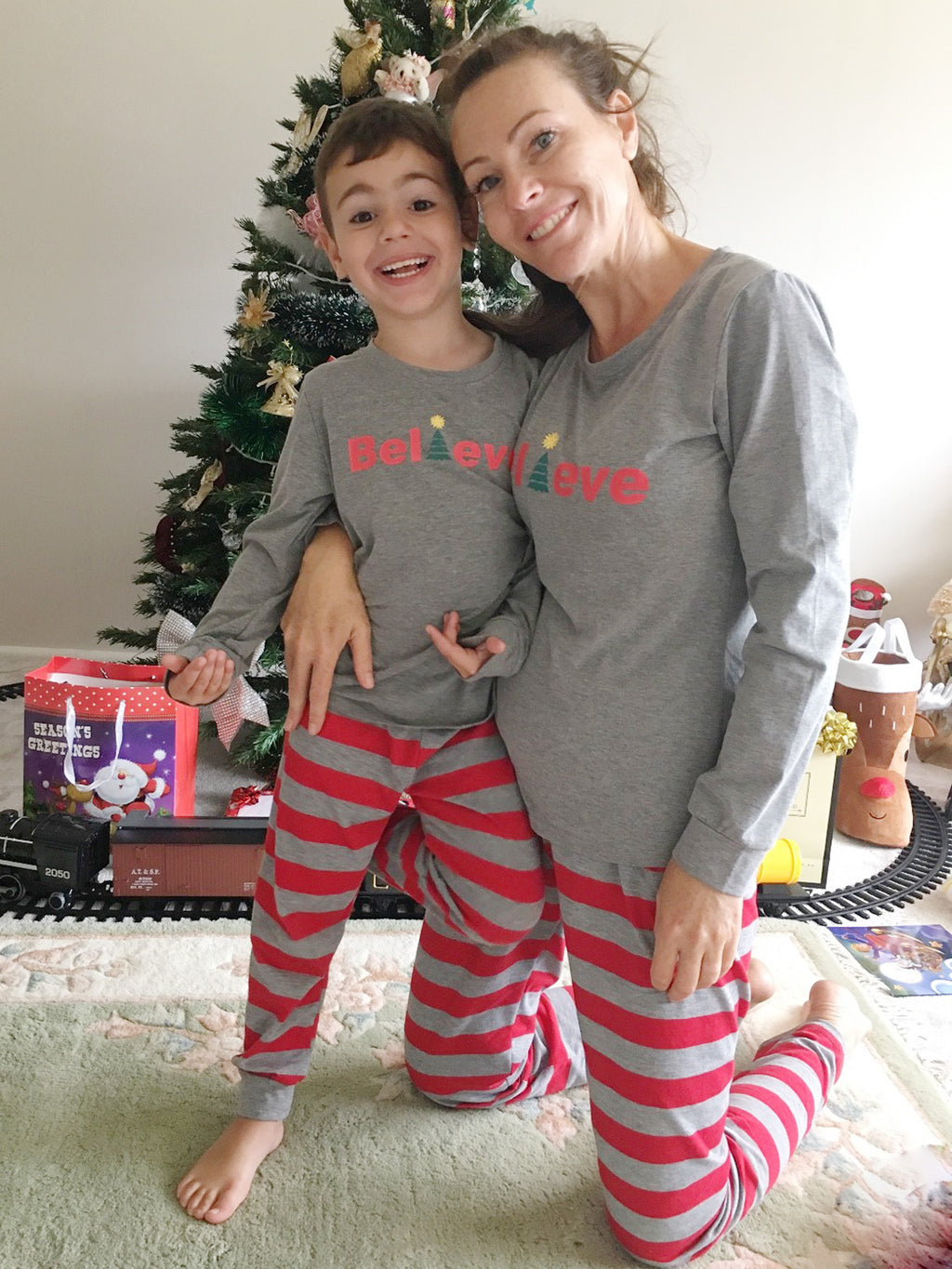 IFFEI Family Matching Pajamas Set Christmas PJ's Sleepwear Believe Printed Top and Striped Bottom with Pocket